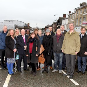 Local businesses rally together to protestr about the potential introduction of parking charges